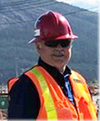 A person wearing a safety vest  Description automatically generated with medium confidence